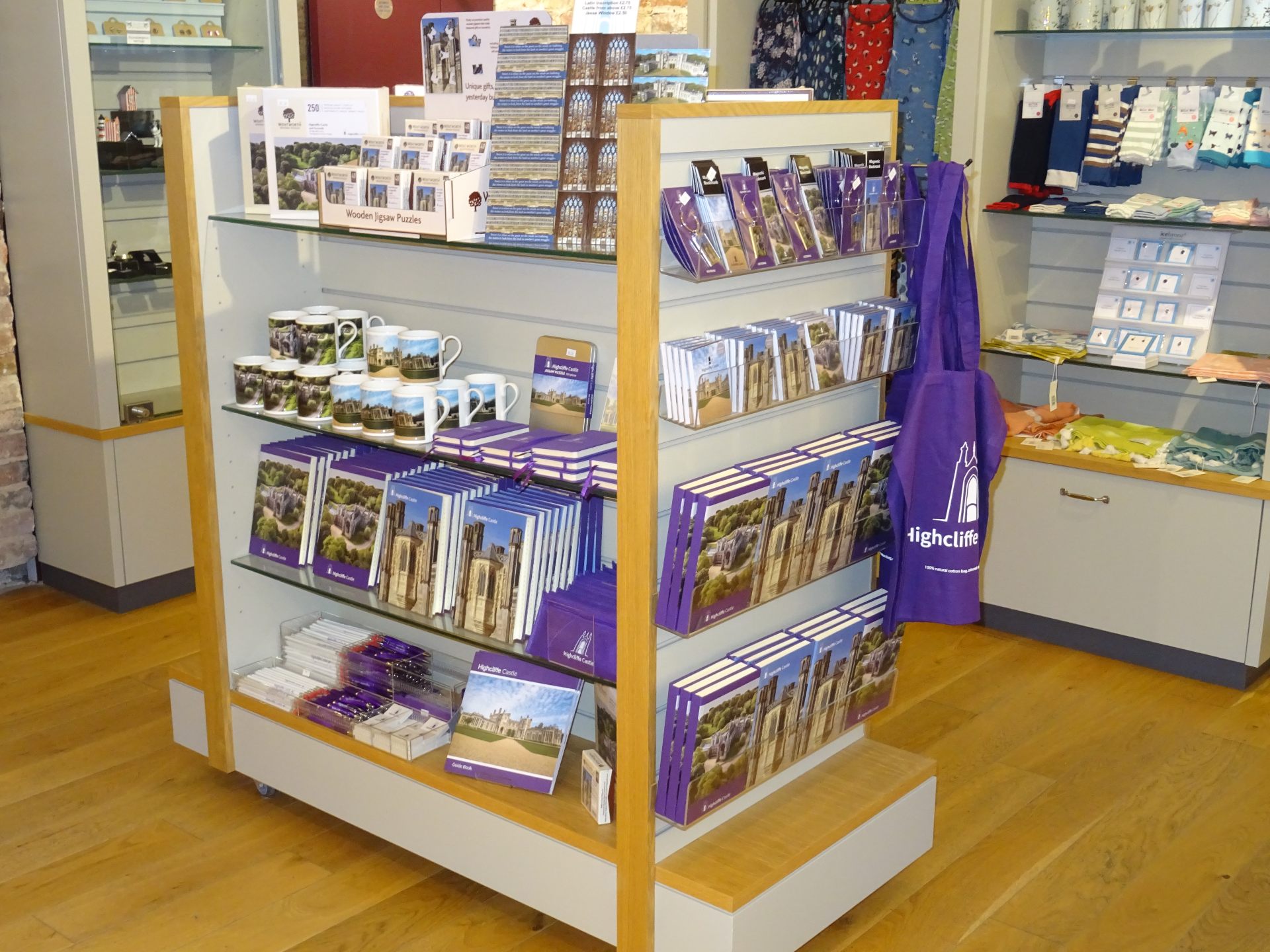 Shop stand showing purple Highcliffe Branded items