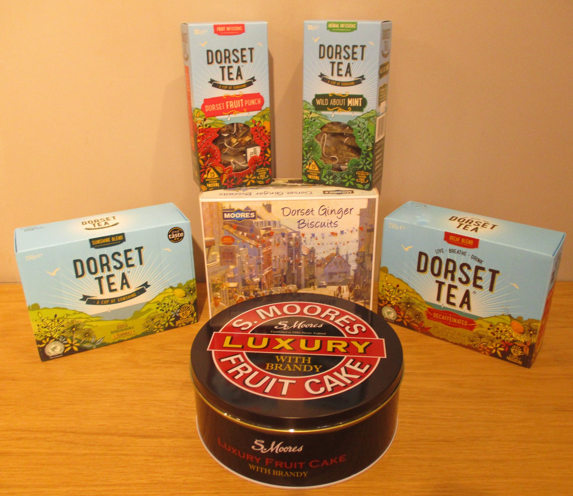 Dorset Tea selection and Moores biscuits, and fruit cake in a luxury tin