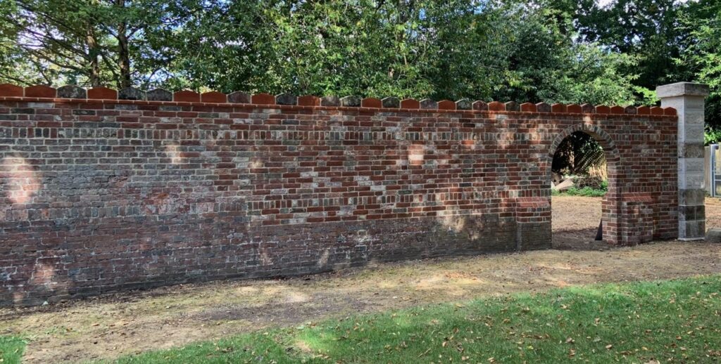 Brick wall with arch